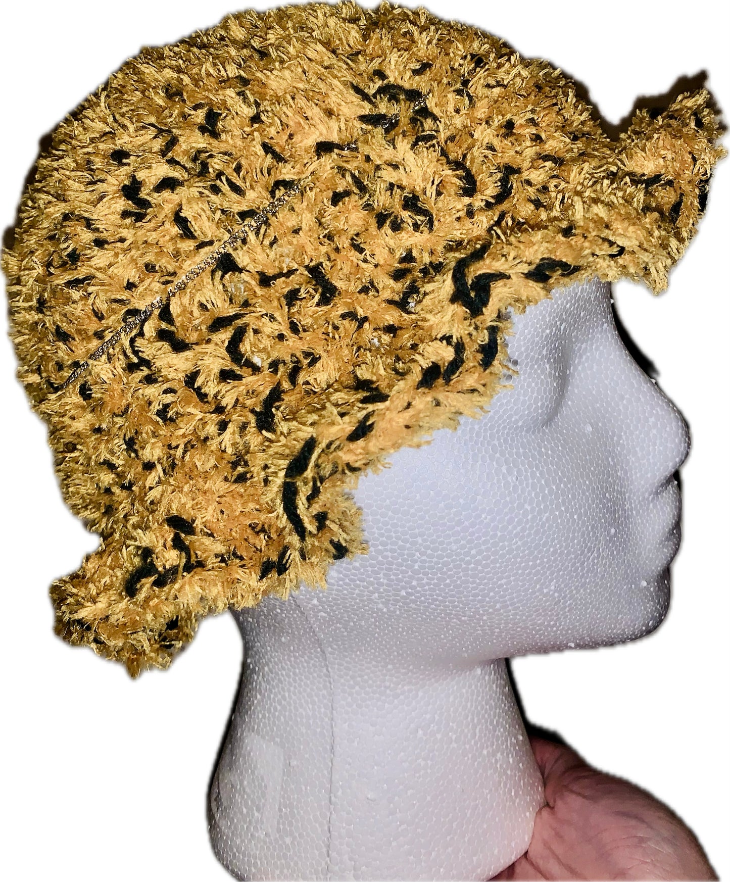 Black and gold hat with ruffles