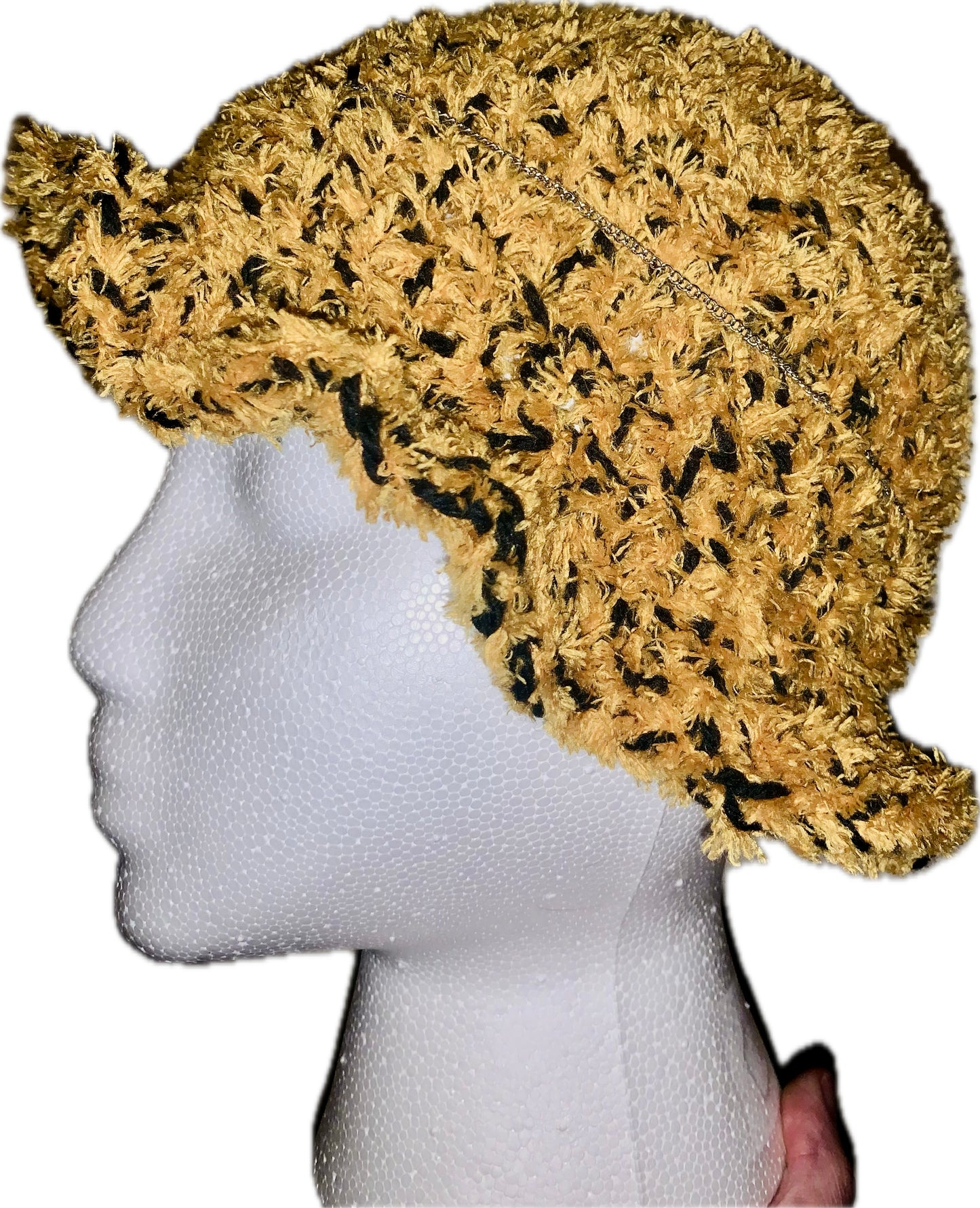 Black and gold hat with ruffles